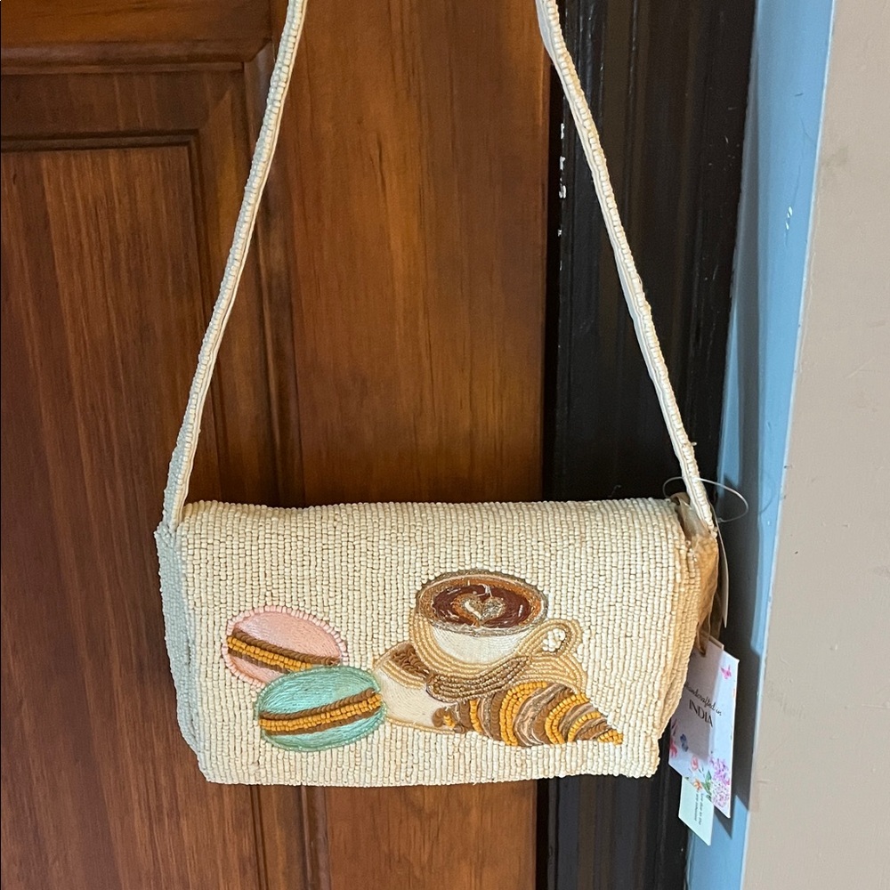 Elegant Cream Beaded Shoulder Bag with Coffee Design